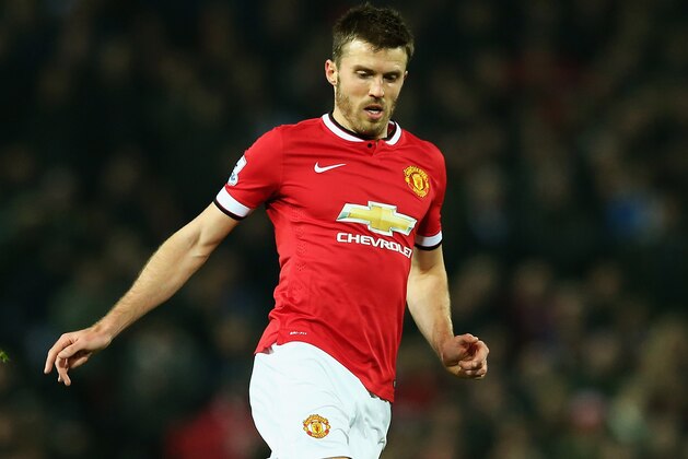 MANCHESTER, ENGLAND - NOVEMBER 29:  Michael Carrick of Manchester United in action during the Barclays Premier League match between Manchester United and Hull City at Old Trafford on November 29, 2014 in Manchester, England.  (Photo by Matthew Lewis/Getty Images)