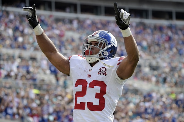 New York Giants running back Rashad Jennings (23) celebrates after a 2-yard touchdown run against the Jacksonville Jaguars during the first half of an NFL football game in Jacksonville, Fla., Sunday, Nov. 30, 2014. (AP Photo/Phelan M. Ebenhack) New York Giants running back Rashad Jennings (23) celebrates after a 2-yard touchdown run against the Jacksonville Jaguars during the first half of an NFL football game in Jacksonville, Fla., Sunday, Nov. 30, 2014. (AP Photo/Phelan M. Ebenhack)