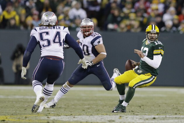 Green Bay Packers' Aaron Rodgers during the second half of an NFL football game against the New England Patriots Sunday, Nov. 30, 2014, in Green Bay, Wis. (AP Photo/Tom Lynn)