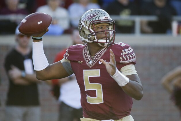 Florida State quarterback Jameis Winston throws a pass during the first half of an NCAA college football game against Florida in Tallahassee, Fla., Saturday, Nov. 29, 2014. (AP Photo/John Raoux)