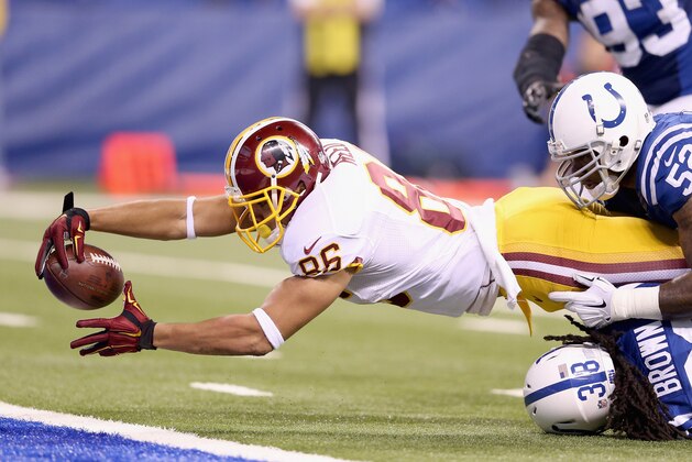 INDIANAPOLIS, IN - NOVEMBER 30: Jordan Reed #86 of the Washington Redskins reaches for the goal line during the game against the Indianapolis Colts at Lucas Oil Stadium on November 30, 2014 in Indianapolis, Indiana.  (Photo by Andy Lyons/Getty Images)