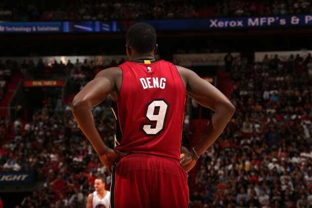 MIAMI, FL - NOVEMBER 25:  Luol Deng #9 of the Miami Heat looks on during the game against the Golden State Warriors on November 25, 2014 at American Airlines Arena in Miami, Florida.  NOTE TO USER: User expressly acknowledges and agrees that, by downloading and or using this Photograph, user is consenting to the terms and conditions of the Getty Images License Agreement. Mandatory Copyright Notice: Copyright 2014 NBAE (Photo by Issac Baldizon/NBAE via Getty Images)