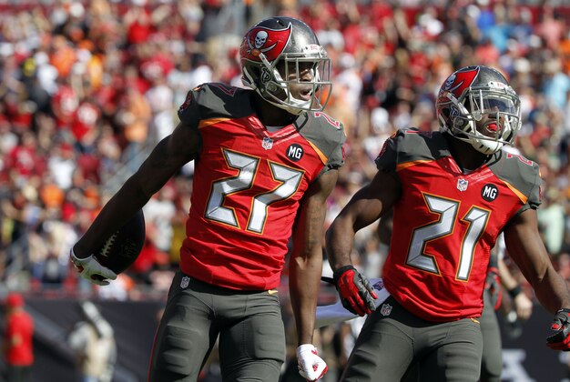 Nov 30, 2014; Tampa, FL, USA; Tampa Bay Buccaneers cornerback Johnthan Banks (27) celebrates after he intercepted the ball against the Cincinnati Bengals during the first half at Raymond James Stadium. Mandatory Credit: Kim Klement-USA TODAY Sports
