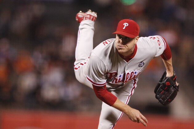 Philadelphia Phillies pitcher Jonathan Papelbon watches his pitch during the tenth inning of a baseball game against the San Francisco Giants, Friday, August 15, 2014, in San Francisco. (AP Photo/Beck Diefenbach)
