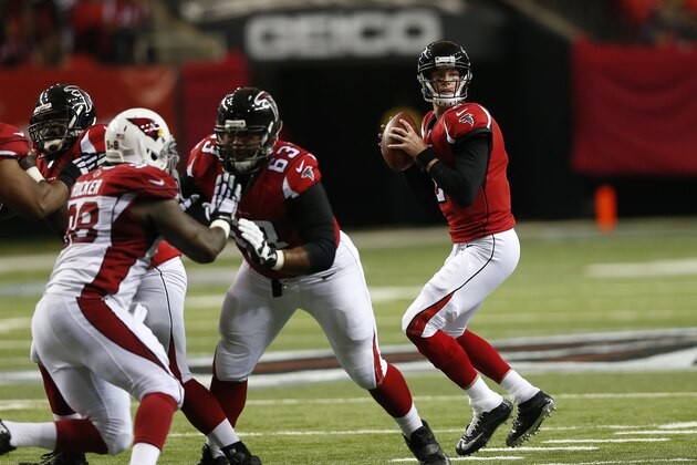 Atlanta Falcons quarterback Matt Ryan (2) prepares to pass against the Arizona Cardinals during the first half of an NFL football game, Sunday, Nov. 30, 2014, in Atlanta. Arizona Cardinals free safety Rashad Johnson intercepted the ball and scored a touchdown on the play. (AP Photo/John Bazemore)