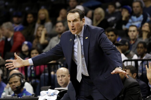 Duke head coach Mike Krzyzewski talks to his team during the second half of an NCAA college basketball game against Stanford for first place in the Coaches vs. Cancer Classic, Saturday, Nov. 22, 2014, in New York. Duke defeated Stanford 70-59. (AP Photo/Seth Weng)