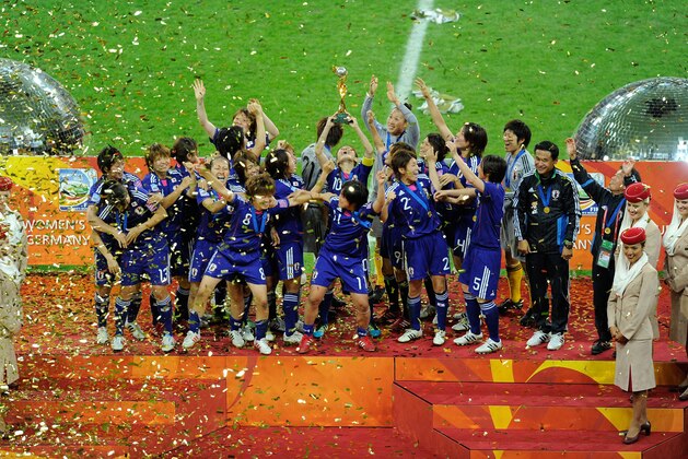 FRANKFURT AM MAIN, GERMANY - JULY 17:  The team of Japan celebrates after winning the FIFA Womens's World Cup Final between the United States of America and Japan at FIFA Word Cup stadium on July 17, 2011 in Frankfurt am Main, Germany.  (Photo by Thorsten Wagner/Getty Images)