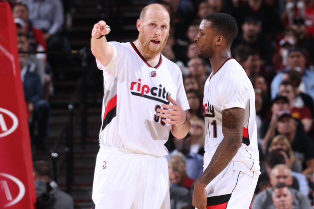 PORTLAND, OR - NOVEMBER 4:  Chris Kaman #35 of the Portland Trail Blazers talks with Thomas Robinson #41 of the during the game against the Cleveland Cavaliers on November 4, 2014 at the Moda Center Arena in Portland, Oregon. NOTE TO USER: User expressly acknowledges and agrees that, by downloading and or using this photograph, user is consenting to the terms and conditions of the Getty Images License Agreement. Mandatory Copyright Notice: Copyright 2014 NBAE (Photo by Sam Forencich/NBAE via Getty Images)