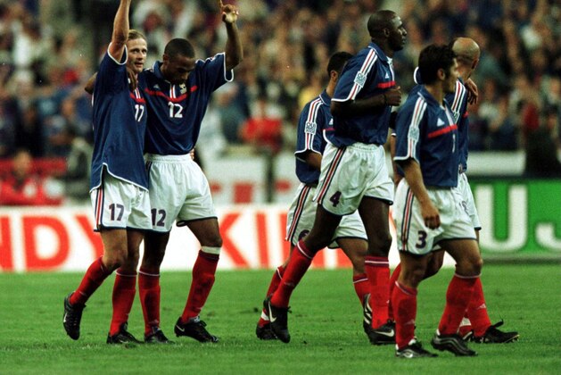 2 Sep 2000: Emmanuel Petit of France celebrates with Thierry Henry after scoring the first goal during the France v England Nationwide International Friendly from the Stade de France, Paris. Mandatory Credit: Clive Brunskill/ALLSPORT