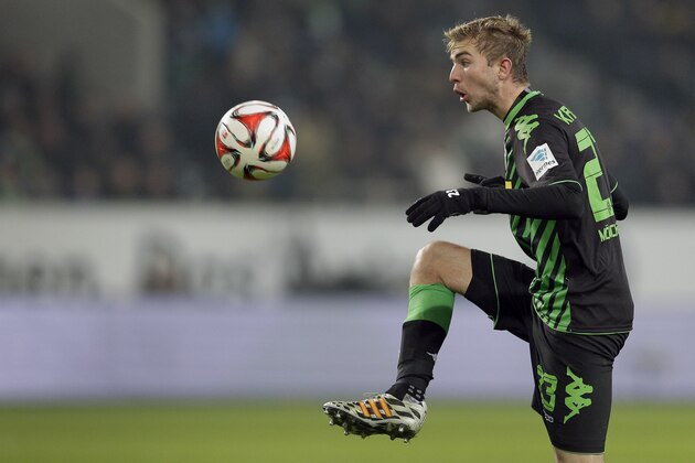 Moenchengladbach's Christoph Kramer plays the ball during the German Bundesliga soccer match between VfL Wolfsburg and Borussia Moenchengladbach at the Volkswagen Arena stadium in Wolfsburg, Germany, Sunday, Nov. 30, 2014. Wolfsburg defeated Moenchengladbach by 1-0. (AP Photo/Michael Sohn)