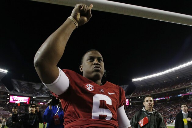 Alabama quarterback Blake Sims (6) celebrates after the second half of the Iron Bowl NCAA college football game against Auburn, Saturday, Nov. 29, 2014, in Tuscaloosa, Ala. Alabama won 55-44. (AP Photo/Butch Dill)