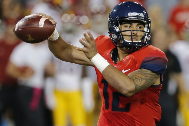 Arizona quarterback Anu Solomon (12) during the second half of an NCAA college football game against Southern California, Saturday, Oct. 11, 2014, in Tucson, Ariz. (AP Photo/Rick Scuteri)