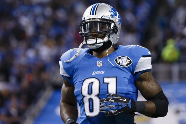 Detroit Lions wide receiver Calvin Johnson (81) during player introductions before an NFL football game against the Chicago Bears at Ford Field in Detroit, Thursday, Nov. 27, 2014. (AP Photo/Rick Osentoski)