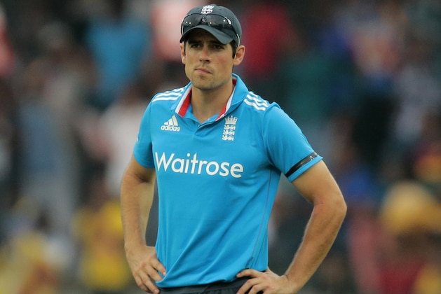 England's captain Alastair Cook stands on the field during the second one day international cricket match between Sri Lanka and England in Colombo, Sri Lanka, Saturday, Nov. 29, 2014. ( AP Photo/Eranga Jayawardena)