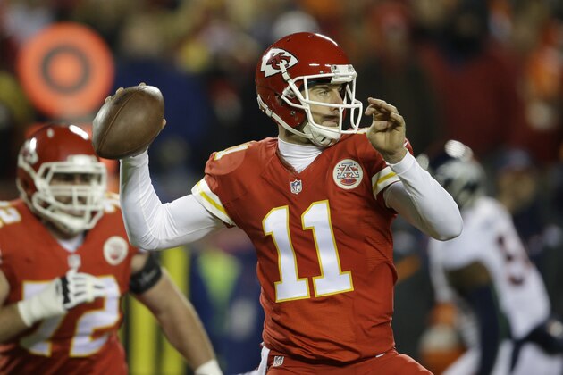Kansas City Chiefs quarterback Alex Smith (11) throws in the first half of an NFL football game against the Denver Broncos in Kansas City, Mo., Sunday, Nov. 30, 2014. (AP Photo/Orlin Wagner)