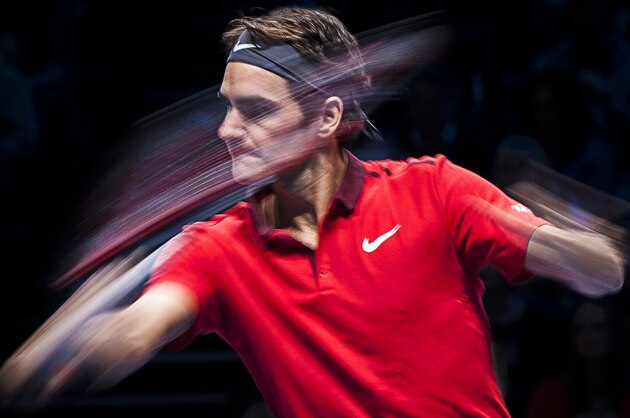 LONDON, ENGLAND - NOVEMBER 11:  Roger Federer of Switzerland in action during the round robin singles match against Kei Nishikori of Japan on day three of the Barclays ATP World Tour Finals at the O2 Arena on November 11, 2014 in London, England.  (Photo by Justin Setterfield/Getty Images)