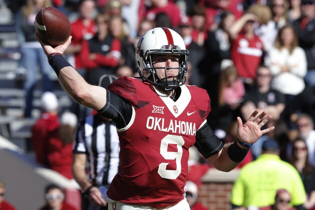 Oklahoma quarterback Trevor Knight (9) is pictured during an NCAA college football game between Baylor and Oklahoma in Norman, Okla., Saturday, Nov. 8, 2014. Baylor won 48-14. (AP Photo/Sue Ogrocki)