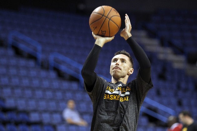 Los Angeles Lakers guard Steve Nash shoots during warmups for a preseason NBA basketball game against the Golden State Warriors, Sunday, Oct. 12, 2014, in Ontario, Calif. (AP Photo/Alex Gallardo)