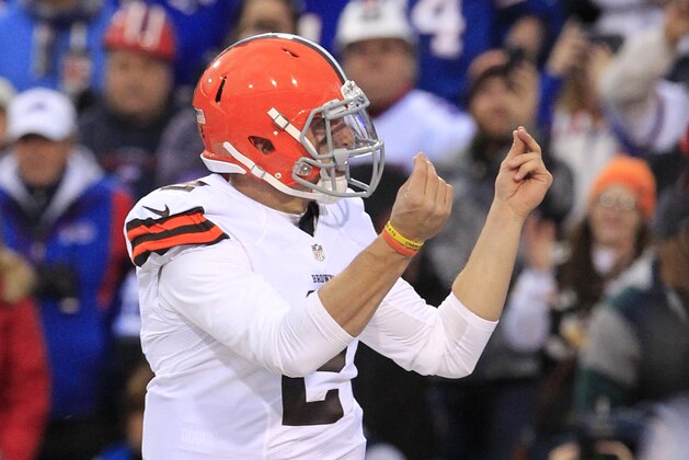 Cleveland Browns quarterback Johnny Manziel celebrates after scoring a touchdown against the Buffalo Bills during the second half of an NFL football game, Sunday, Nov. 30, 2014, in Orchard Park, N.Y. The Bills won 26-10. (AP Photo/Bill Wippert)