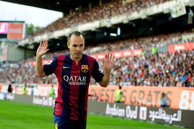 MADRID, SPAIN - OCTOBER 04:  Andres Iniesta of FC Barcelona reacts during the La Liga match between Rayo Vallecano de Madrid and FC Barcelona at Estadio Teresa Rivero on October 4, 2014 in Madrid, Spain.  (Photo by Denis Doyle/Getty Images)