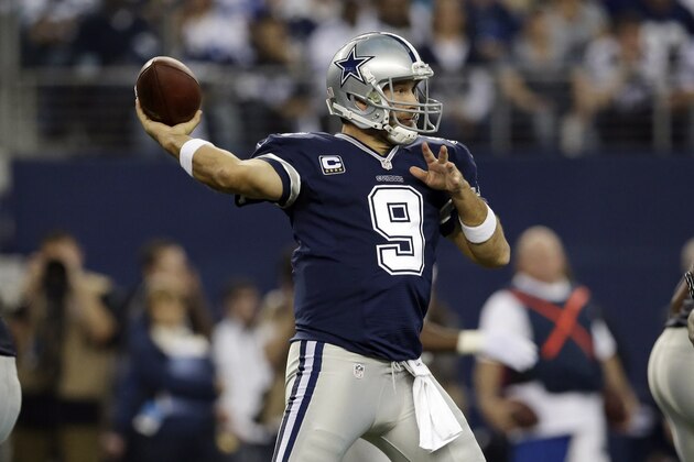 Dallas Cowboys quarterback Tony Romo (9) passes the ball against the Philadelphia Eagles during the first half of an NFL football game, Thursday, Nov. 27, 2014, in Arlington, Texas. (AP Photo/Tim Sharp)