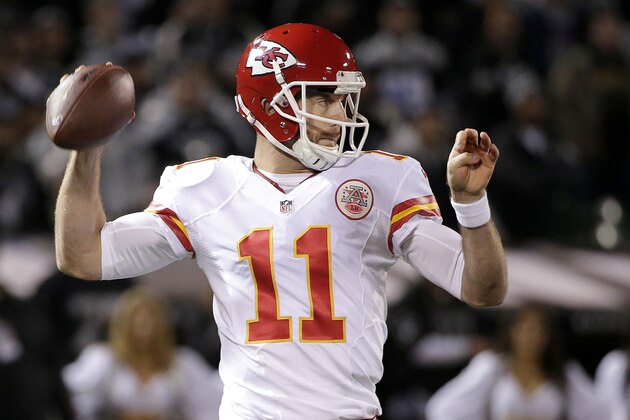 Kansas City Chiefs quarterback Alex Smith passes against the Oakland Raiders during the first quarter of an NFL football game in Oakland, Calif., Thursday, Nov. 20, 2014. (AP Photo/Marcio Jose Sanchez)