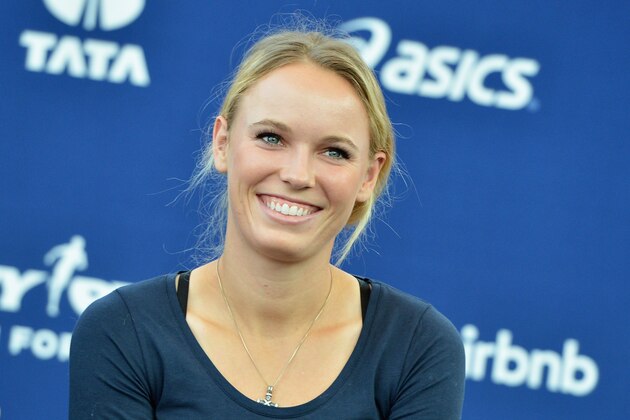 NEW YORK, NY - OCTOBER 29:  Tennis player Caroline Wozniacki picks up her New York City Marathon official race bib at The Jacob K. Javits Convention Center on October 29, 2014 in New York City.  (Photo by Slaven Vlasic/Getty Images)