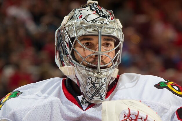 DETROIT, MI - NOVEMBER 14: Corey Crawford #50 of the Chicago Blackhawks looks down the ice against the Detroit Red Wings during a NHL game on November 14, 2014 at Joe Louis Arena in Detroit, Michigan. The Wings defeated the Hawks 4-1 (Photo by Dave Reginek/NHLI via Getty Images)