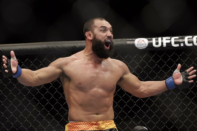 Johny Hendricks reacts following a UFC 167 mixed martial arts championship welterweight bout against Georges St. Pierre, of Canada, on Saturday, Nov. 16, 2013, in Las Vegas. St. Pierre won by split decision. (AP Photo/Isaac Brekken)