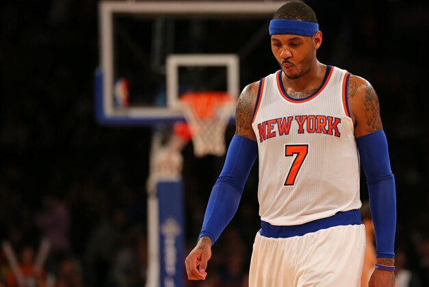 Nov 30, 2014; New York, NY, USA; New York Knicks forward Carmelo Anthony (7) reacts against the Miami Heat during the fourth quarter at Madison Square Garden. The Heat defeated the Knicks 86-79. Mandatory Credit: Adam Hunger-USA TODAY Sports