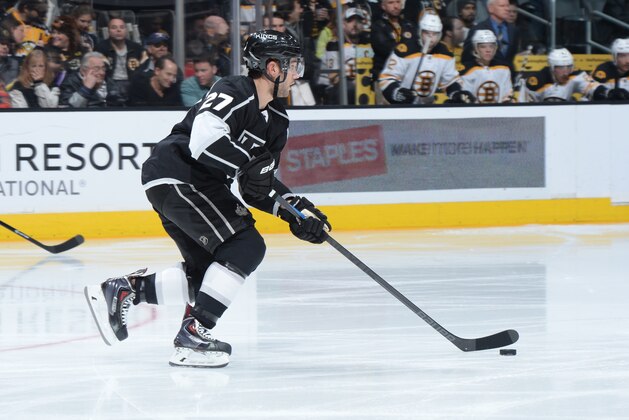 LOS ANGELES, CA - DECEMBER 02: Alec Martinez #27 of the Los Angeles Kings handles the puck during a game against the Boston Bruins at STAPLES Center on December 02, 2014 in Los Angeles, California. (Photo by Andrew D. Bernstein/NHLI via Getty Images)