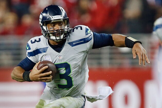 SANTA CLARA, CA - NOVEMBER 27:  Quarterback Russell Wilson #3 of the Seattle Seahawks scrambles for a 12-yard gain against the San Francisco 49ers in the fourth quarter on November 27, 2014 at Levi's Stadium in Santa Clara, California.  The Seahawks won 19-3. (Photo by Brian Bahr/Getty Images)
