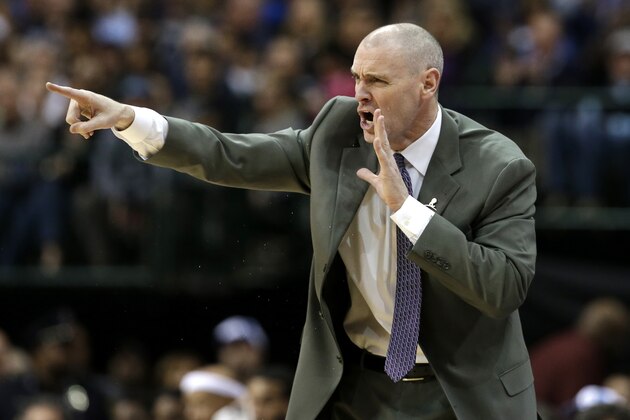 Dallas Mavericks head coach Rick Carlisle instructs his team during an offensive possession in the second half of an NBA basketball game against the Indiana Pacers, Monday, Nov. 24, 2014, in Dallas. The Pacers won 111-100. (AP Photo/Tony Gutierrez)