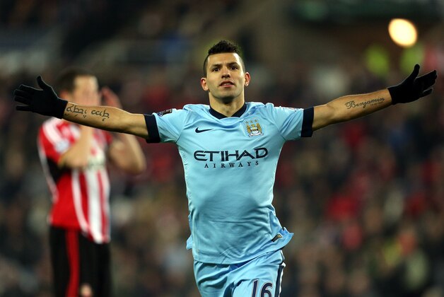 Manchester City's Sergio Aguero celebrates his goal during their English Premier League soccer match against Sunderland at the Stadium of Light, Sunderland, England, Wednesday, Dec. 3, 2014. (AP Photo/Scott Heppell)