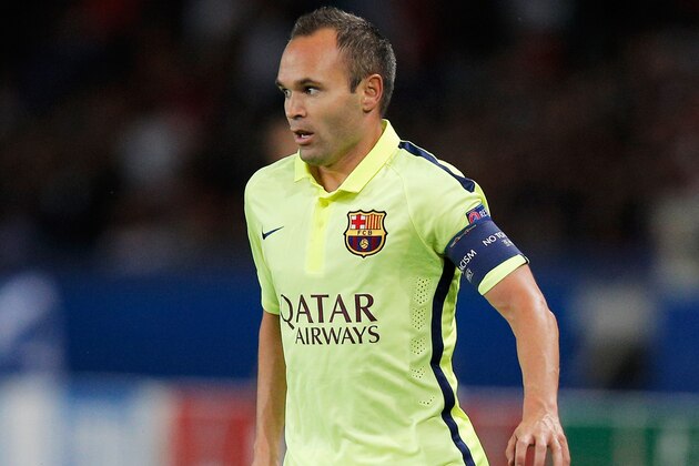 PARIS, FRANCE - SEPTEMBER 30:  Andres Iniesta of Barcelona in action during the Group F UEFA Champions League match between Paris Saint-Germain v FC Barcelona held at Parc des Princes on September 30, 2014 in Paris, France.  (Photo by Dean Mouhtaropoulos/Getty Images)