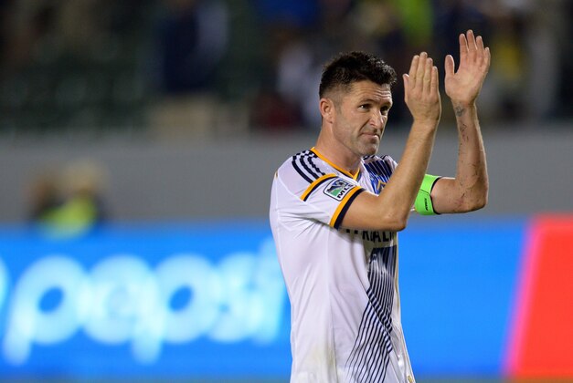 Nov 9, 2014; Carson, CA, USA; Los Angeles Galaxy forward Robbie Keane (7) applauds as he walks off the field after the Galaxy beat Real Salt Lake 5-0 at StubHub Center. Mandatory Credit: Jake Roth-USA TODAY Sports