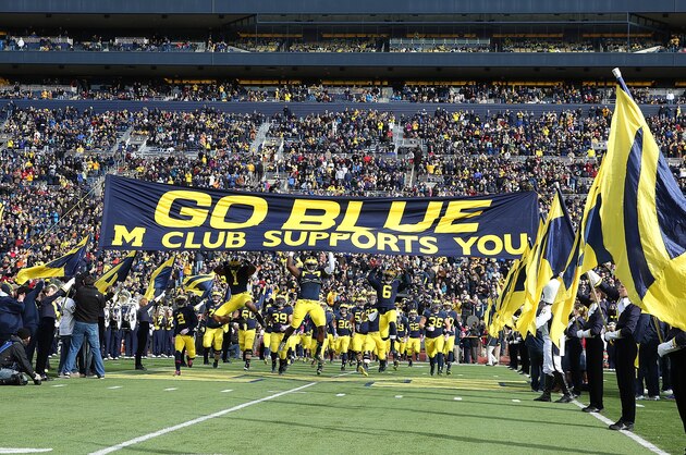 ANN ARBOR, MI - NOVEMBER 1: The Michigan Wolverines enter the stadium prior to the start of the game against the Indiana Hoosiers at Michigan Stadium on November 1 , 2014 in Ann Arbor, Michigan. The Michigan defeated the Hoosiers 34-10. (Photo by Leon Halip/Getty Images)