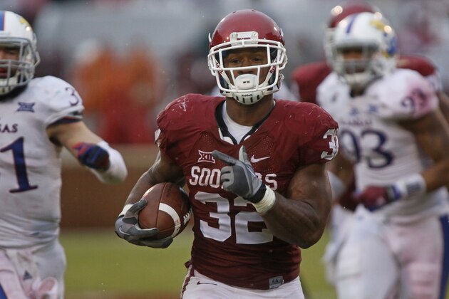 NORMAN, OK - NOVEMBER 22:  Running back Samaje Perine #32 of the Oklahoma Sooners breaks away from the Kansas Jayhawks to score November 22, 2014 at Gaylord Family-Oklahoma Memorial Stadium in Norman, Oklahoma.  (Photo by Brett Deering/Getty Images)