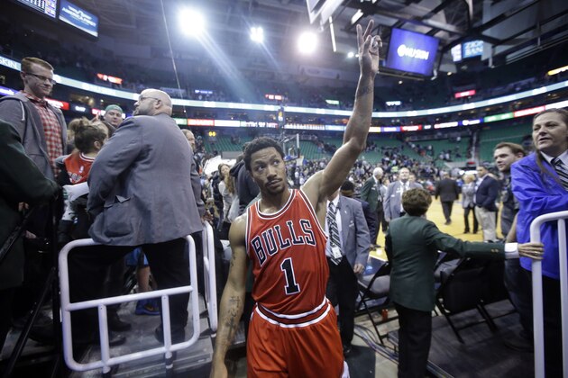 Chicago Bulls' Derrick Rose (1) walks off the court following their NBA basketball game against the Utah Jazz Monday, Nov. 24, 2014, in Salt Lake City. The Bulls won 97-95. (AP Photo/Rick Bowmer)