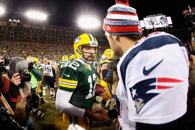 GREEN BAY, WI - NOVEMBER 30:  Quarterbacks Aaron Rodgers #12 of the Green Bay Packers and Tom Brady #12 of the New England Patriots shake hands following the NFL game at Lambeau Field on November 30, 2014 in Green Bay, Wisconsin. The Packers defeated the Patriots 26-21.  (Photo by Christian Petersen/Getty Images)
