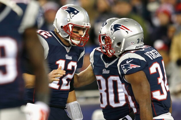 FOXBORO, MA - NOVEMBER 02:  Shane Vereen #34 reacts alongside Tom Brady #12 of the New England Patriots after scoring a touchdown during the second quarter against the Denver Broncos at Gillette Stadium on November 2, 2014 in Foxboro, Massachusetts.  (Photo by Jim Rogash/Getty Images)