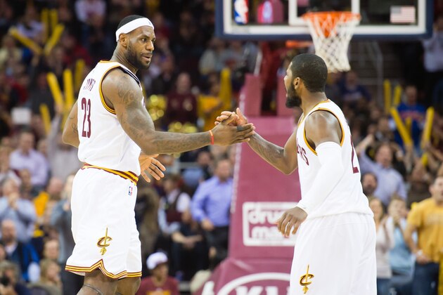 CLEVELAND, OH - DECEMBER 2: LeBron James #23 and Kyrie Irving #2 of the Cleveland Cavaliers celebrate after James scored during the second half against the Milwaukee Bucks at Quicken Loans Arena on December 2, 2014 in Cleveland, Ohio. The Cavaliers defeated the Bucks 111-108. NOTE TO USER: User expressly acknowledges and agrees that, by downloading and or using this photograph, User is consenting to the terms and conditions of the Getty Images License Agreement. (Photo by Jason Miller/Getty Images)