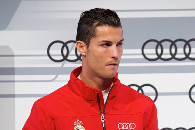 MADRID, SPAIN - DECEMBER 01:  Real Madrid player Cristiano Ronaldo attends the car handover of Audi at the Ciudad Deportiva del Real Madrid on December 1, 2014 in Madrid, Spain.  (Photo by Carlos Alvarez/Getty Images)
