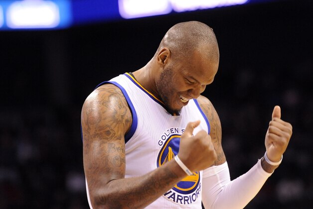 Nov 28, 2014; Charlotte, NC, USA; Golden State Warriors forward center Marreese Speights (5) celebrates after his teammate, guard Klay Thompson (11) (not pictured) scores in the closing seconds of the game against the Charlotte Hornets at Time Warner Cable Arena. Warriors win 106-101. Mandatory Credit: Sam Sharpe-USA TODAY Sports Nov 28, 2014; Charlotte, NC, USA; Golden State Warriors forward center Marreese Speights (5) celebrates after his teammate, guard Klay Thompson (11) (not pictured) scores in the closing seconds of the game against the Charlotte Hornets at Time Warner Cable Arena. Warriors win 106-101. Mandatory Credit: Sam Sharpe-USA TODAY Sports