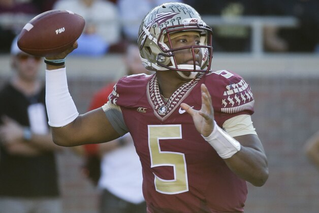 Florida State quarterback Jameis Winston throws a pass during the first half of an NCAA college football game against Florida in Tallahassee, Fla., Saturday, Nov. 29, 2014. (AP Photo/John Raoux)