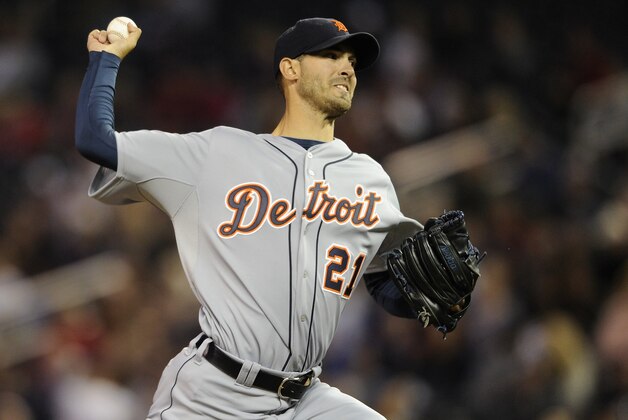 MINNEAPOLIS, MN - SEPTEMBER 16: Rick Porcello #21 of the Detroit Tigers delivers a pitch against the Minnesota Twins during the second inning of the game on September 16, 2014 at Target Field in Minneapolis, Minnesota. (Photo by Hannah Foslien/Getty Images)