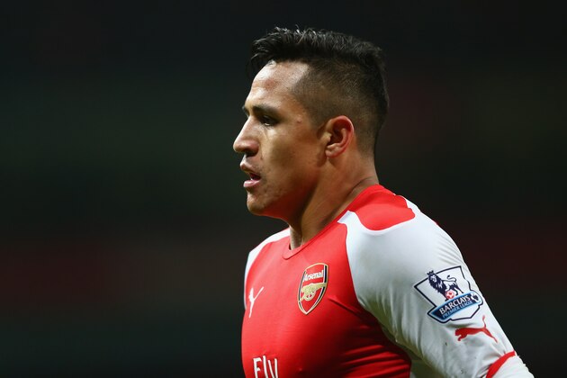 LONDON, ENGLAND - DECEMBER 03: Alexis Sanchez of Arsenal  during the Barclays Premier League match between Arsenal and Southampton at the Emirates Stadium on December 3, 2014 in London, England.  (Photo by Michael Steele/Getty Images)