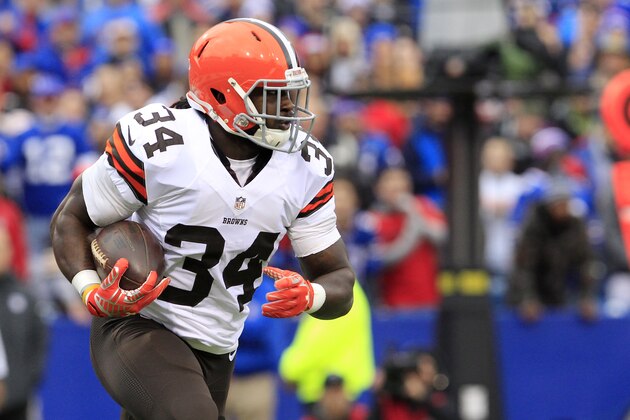 Cleveland Browns running back Isaiah Crowell runs with the ball against the Buffalo Bills during the first half of an NFL football game, Sunday, Nov. 30, 2014, in Orchard Park, N.J. (AP Photo/Bill Wippert)