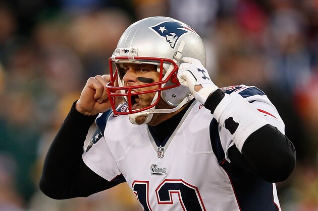 GREEN BAY, WI - NOVEMBER 30:  Quarterback Tom Brady #12 of the New England Patriots calls a play during the NFL game against the Green Bay Packers at Lambeau Field on November 30, 2014 in Green Bay, Wisconsin. The Packers defeated the Patriots 26-21.  (Photo by Christian Petersen/Getty Images)