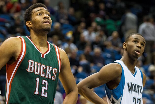 Nov 26, 2014; Minneapolis, MN, USA; Milwaukee Bucks forward Jabari Parker (12) and Minnesota Timberwolves guard Andrew Wiggins (22) look on during the fourth quarter at Target Center. The Bucks defeated the Timberwolves 103-86. Mandatory Credit: Brace Hemmelgarn-USA TODAY Sports